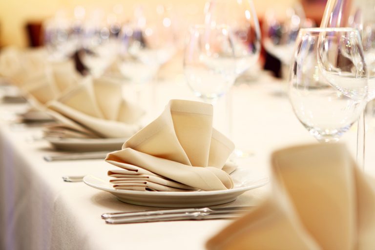 Banquet table with restaurant serving