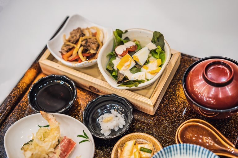 Bento set of prawn tempura and chicken teriyaki in japanese restaurant