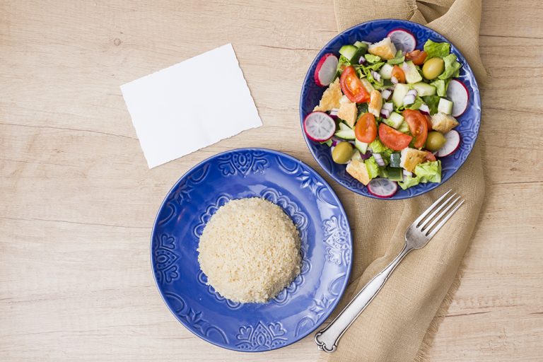 cooked-rice-with-vegetable-salad-table