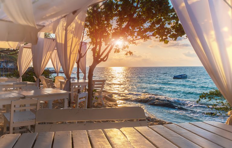 Island blue sea view with white decorataion relax place with sunrise lighting