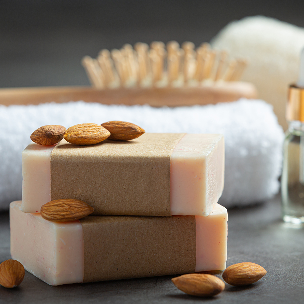 Handmade soap almond on dark background
