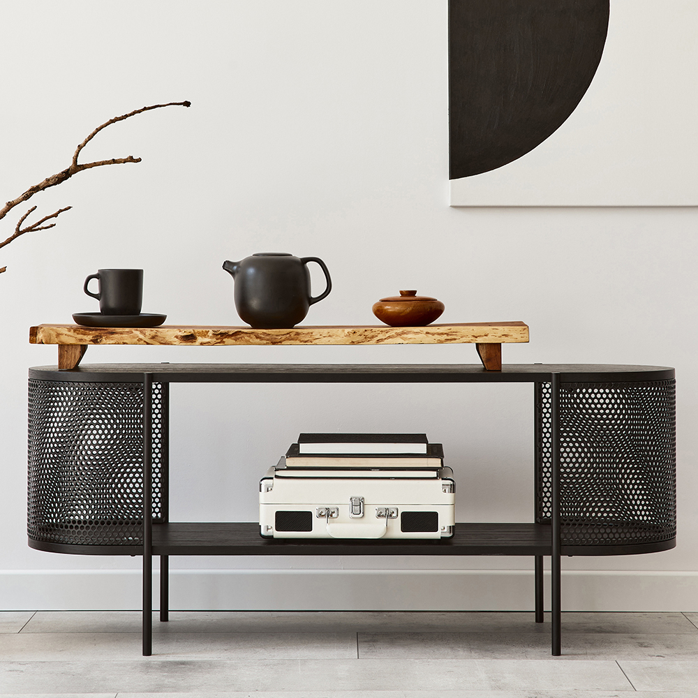 Interior design of modern living room with black stylish commode