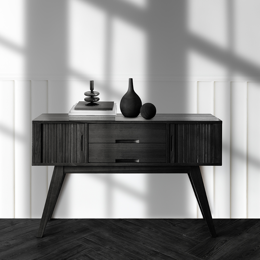 Vase on a wooden sideboard table
