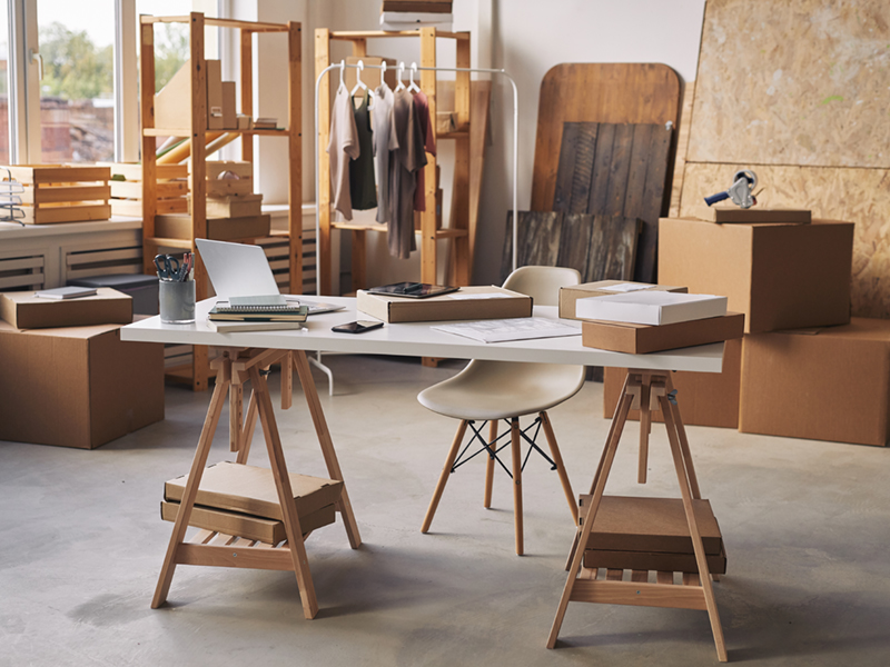 Image of workplace with packed parcels in warehouse